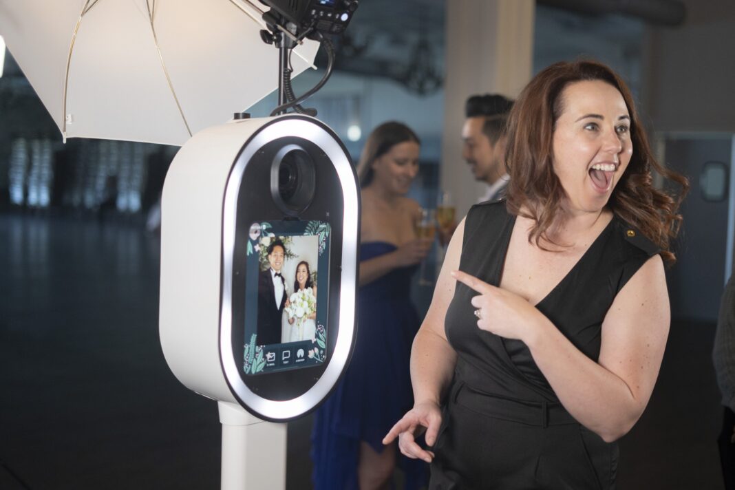 What Impact Do Photo Booths Have on Guest Interaction and Networking? | New York Times Now